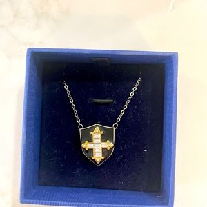 Swarovski shield necklace with box.